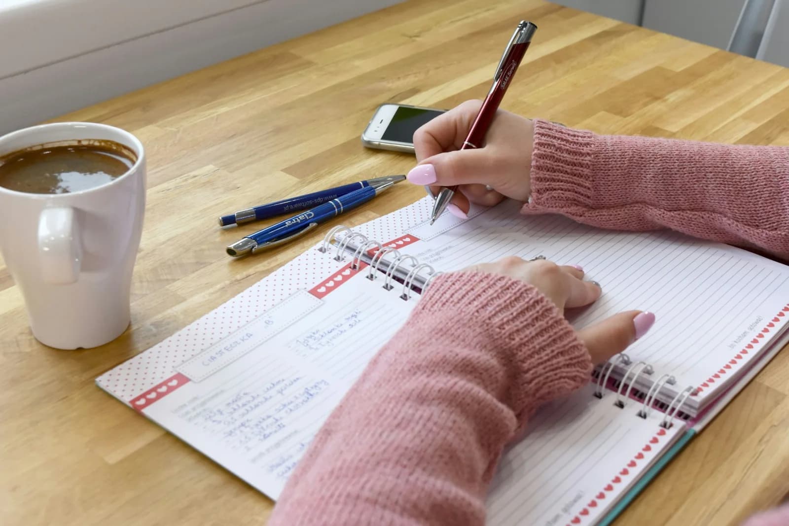 A person taking time to write in a journal